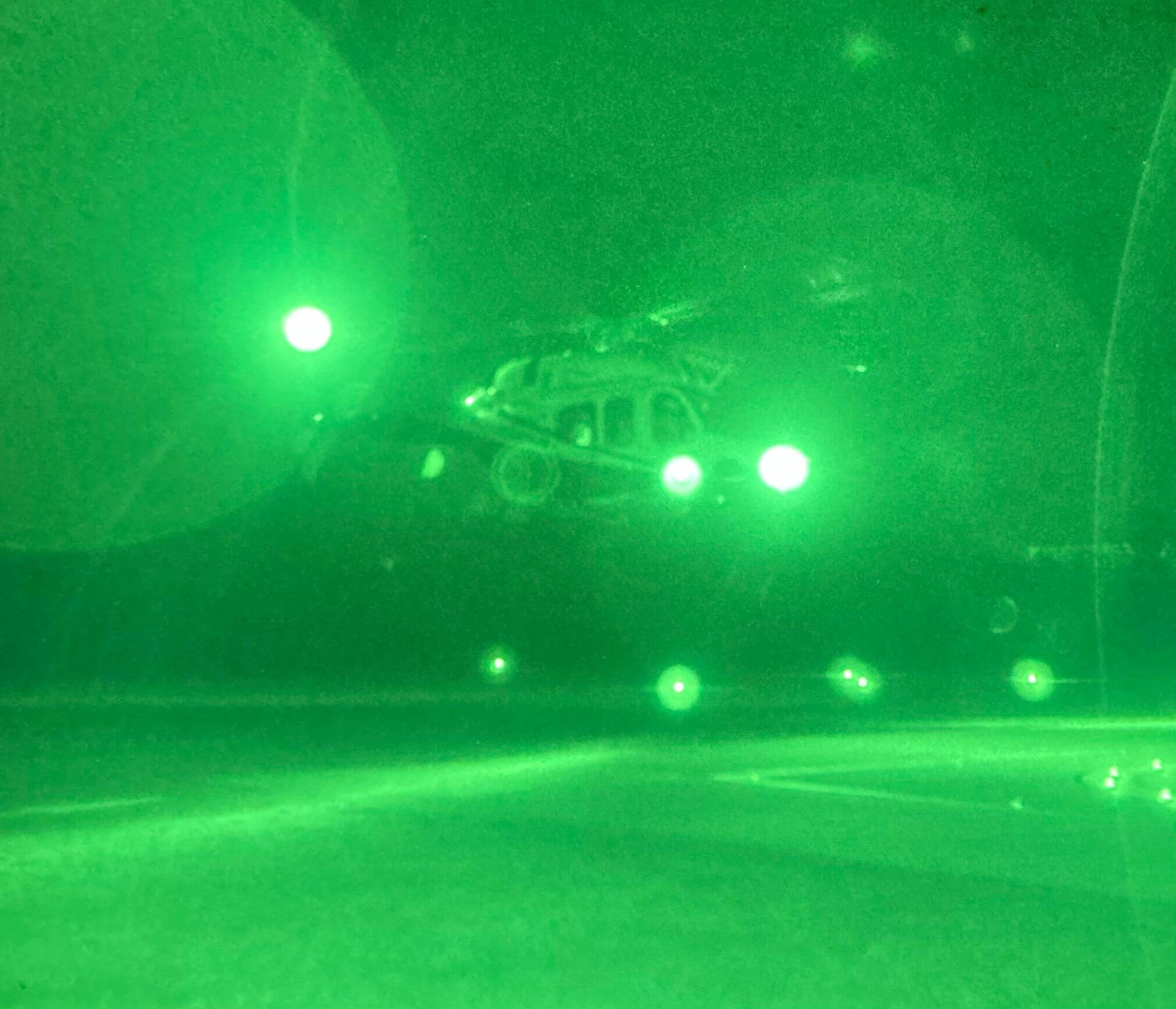 A view of the helicopter through night vision goggles.