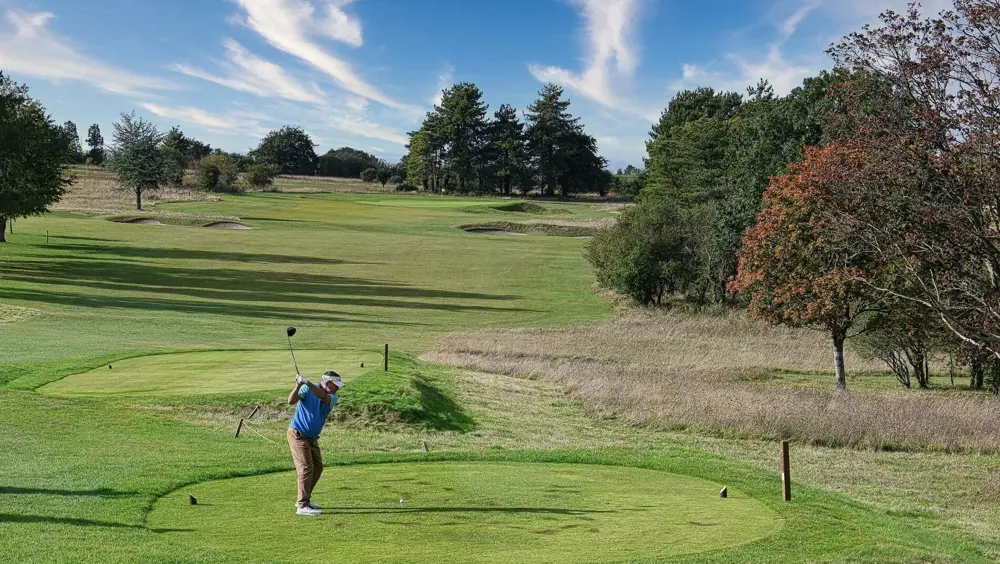 A person playing golf at High Post Golf Club