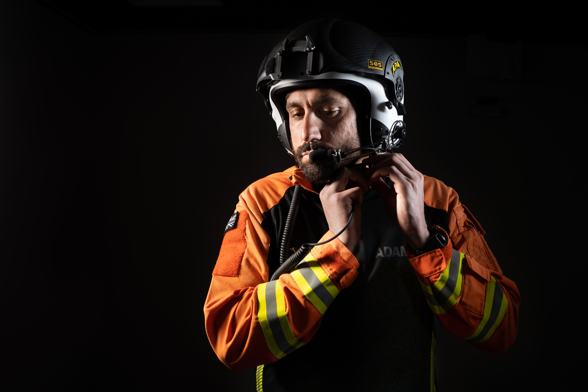 Wiltshire Air Ambulance critical care paramedic Adam Khan securing his flight helmet.